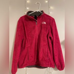hot pink North Face fluffy jacket